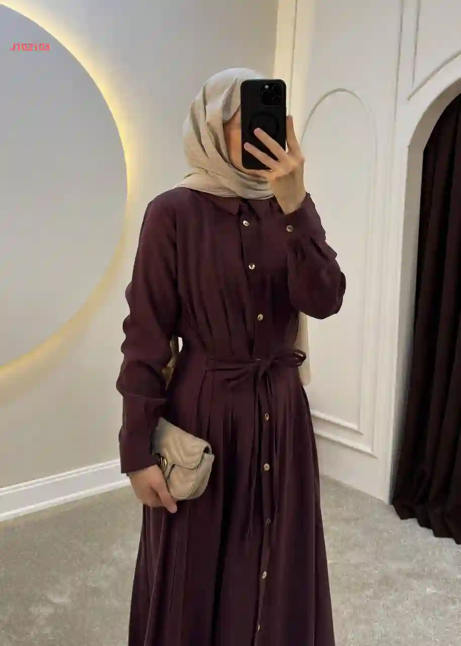 فستان بأزرار سادة مع ربطة خصر