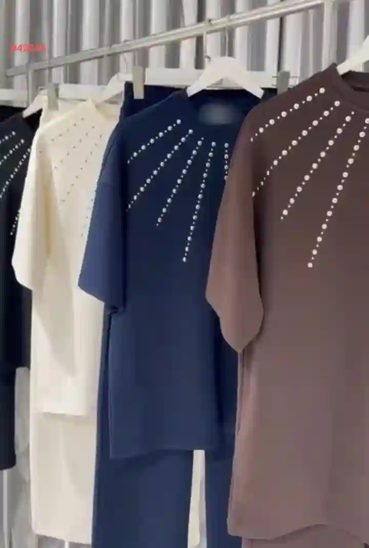 طقم بنطال سبور وكنزة نصف كم باكسسوار