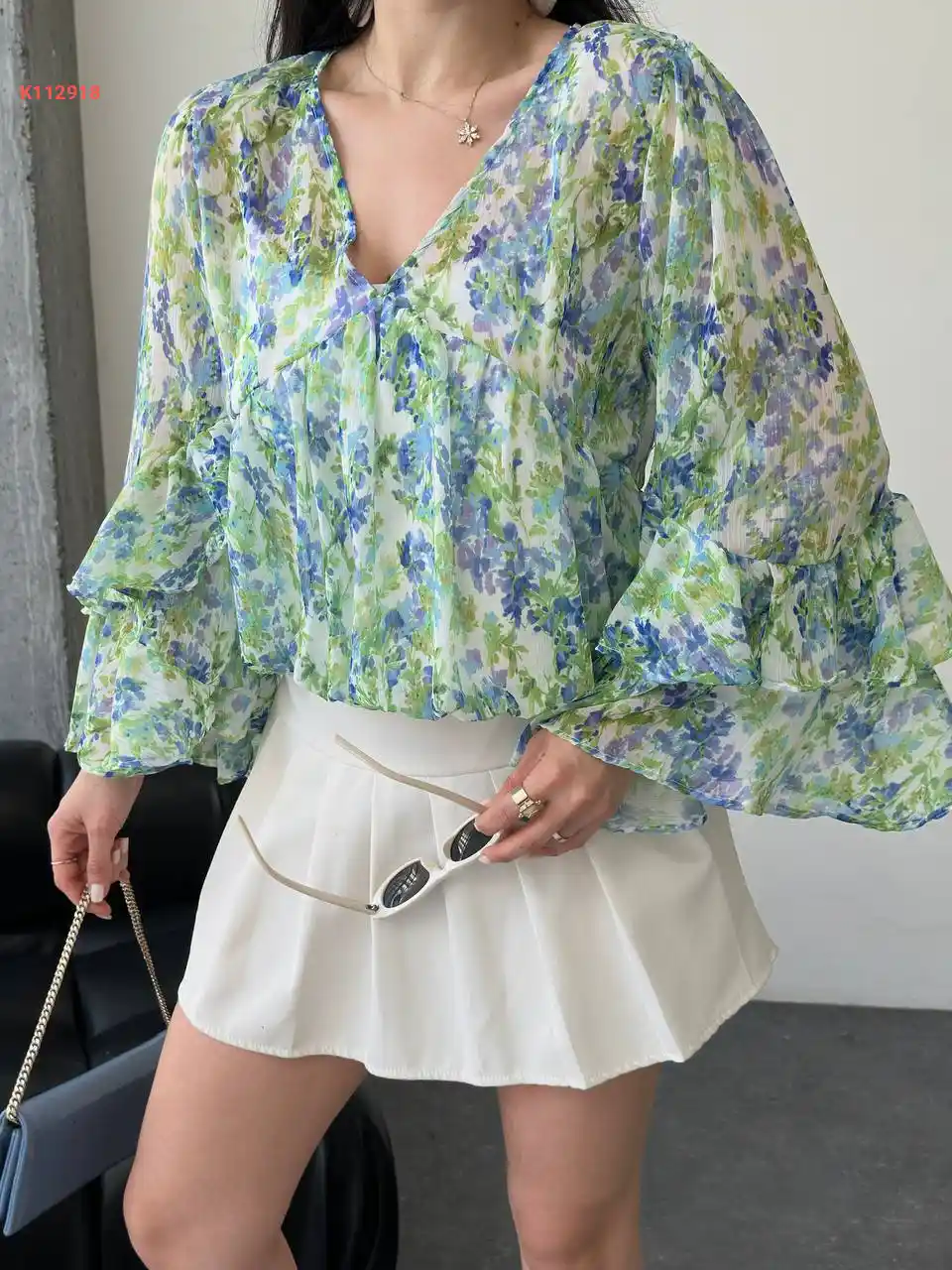 بلوزة شيفون منقوشة بأكمام مكشكشة