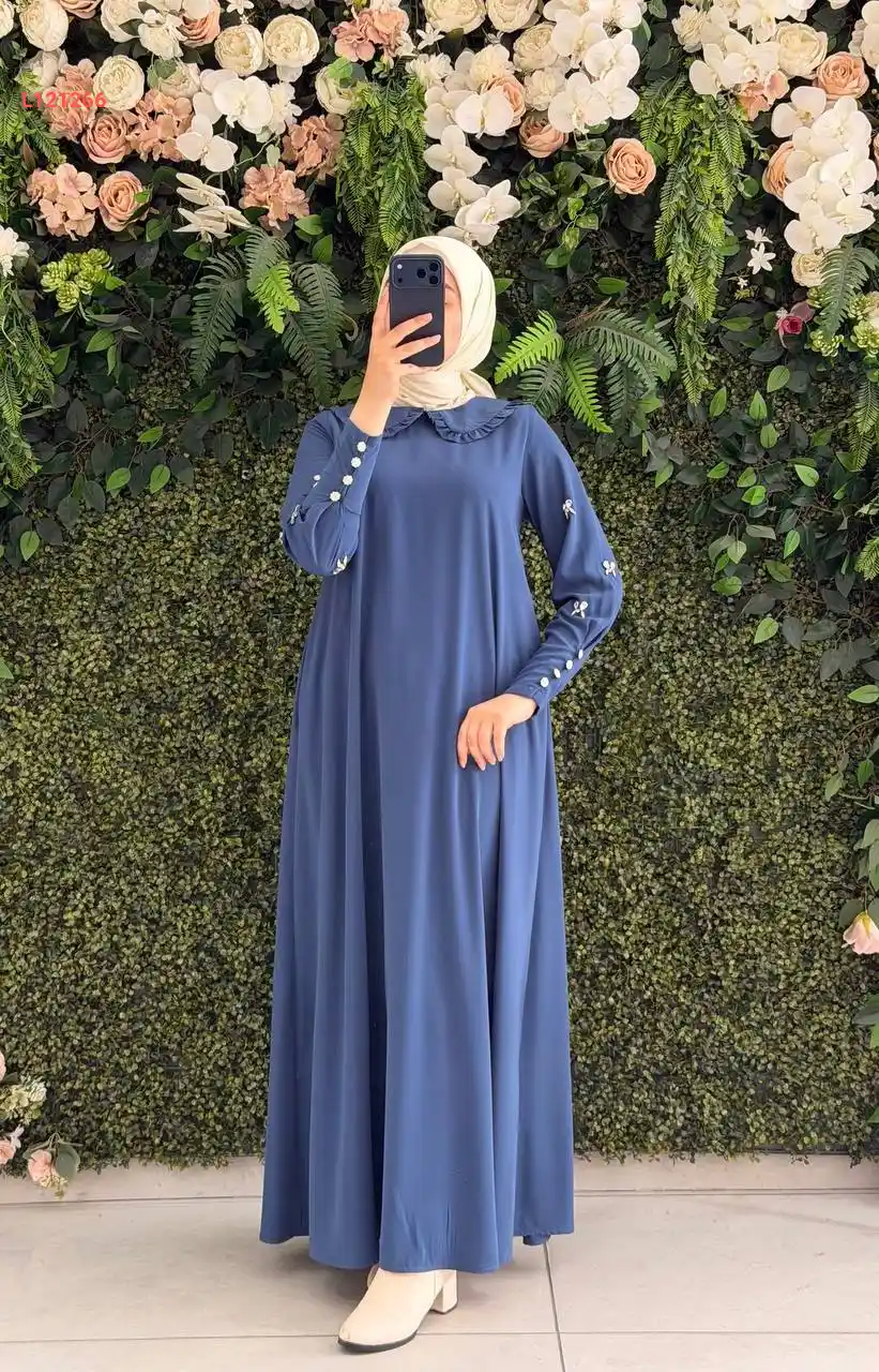 فستان طويل بأكمام مطرزة أحجار