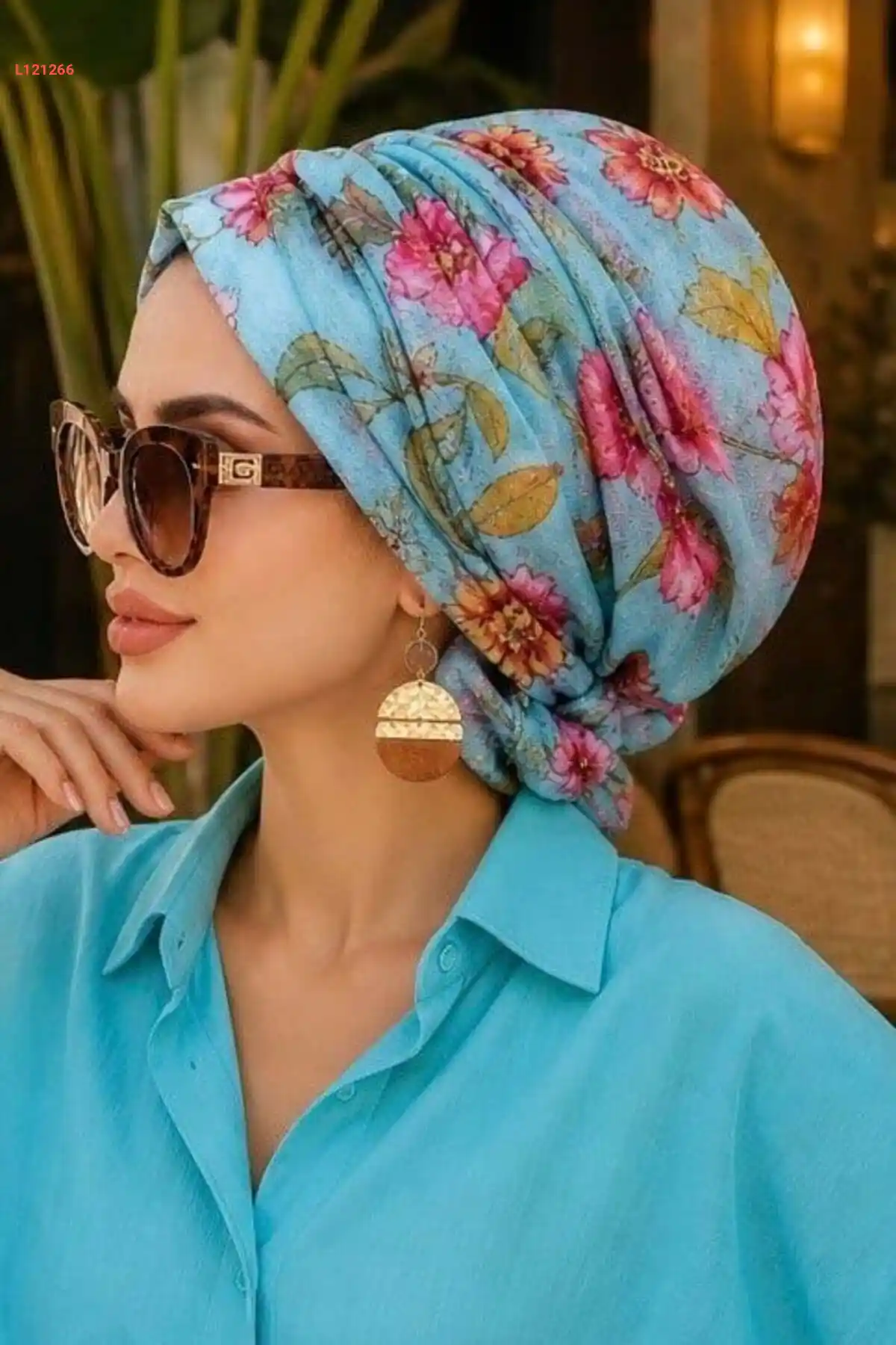 بونيه مزخرف بالزهور بلون التركواز